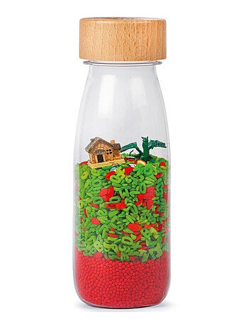 Juguete bebé botella sensorial move | petit boum