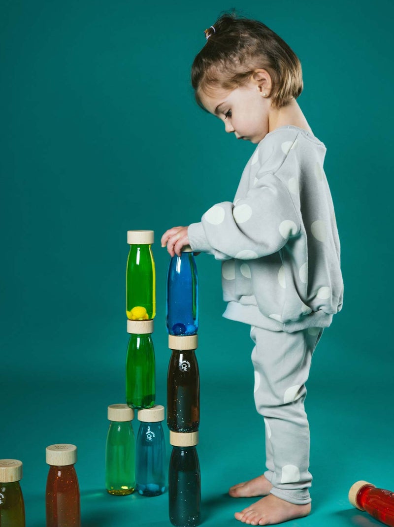 Juguete bebé botella sensorial move | Petit Boum Rojo - Kiabi