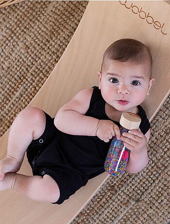 Juguete botella sensorial para bebé con sonido | Petit Boum