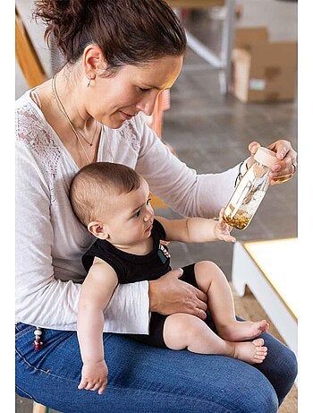 Juguete botella sensorial para bebé con sonido | Petit Boum