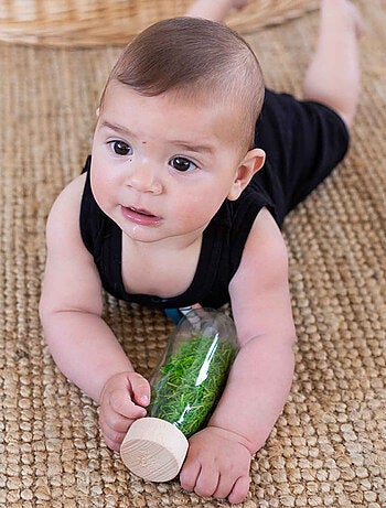 Juguete botella sensorial para bebé con sonido | Petit Boum
