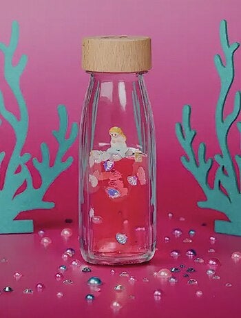 Juguete botella sensorial para bebé con sonido | Petit Boum