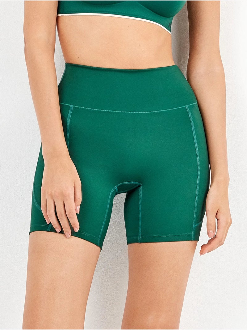 Legging ciclista deportivo de microfibra con bosillos laterales Azul Verde - Kiabi