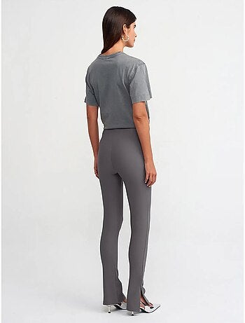 Leggings de tiro alto acampanados con abertura