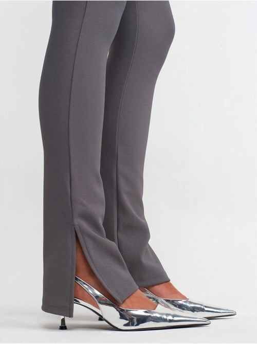 Leggings de tiro alto acampanados con abertura - Kiabi