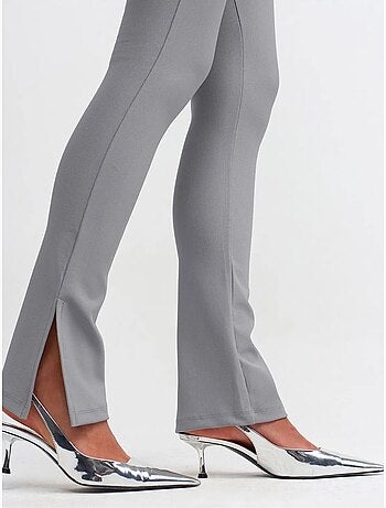 Leggings de tiro alto acampanados con abertura