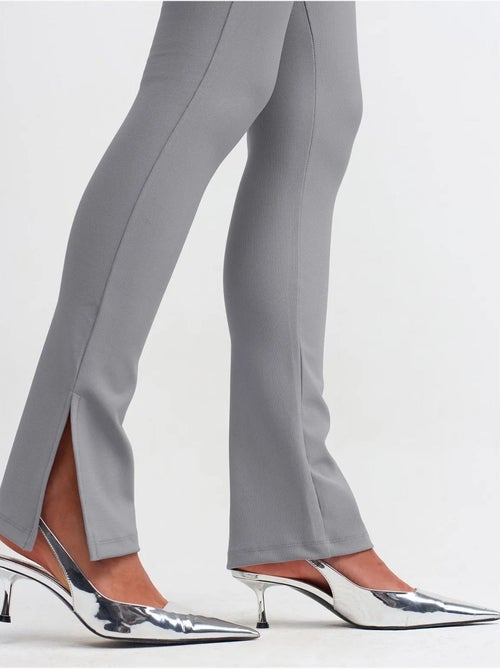 Leggings de tiro alto acampanados con abertura - Kiabi