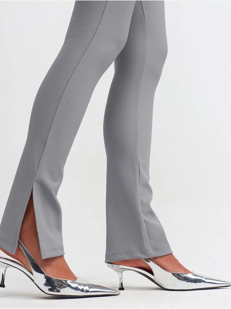 Leggings de tiro alto acampanados con abertura Gris - Kiabi
