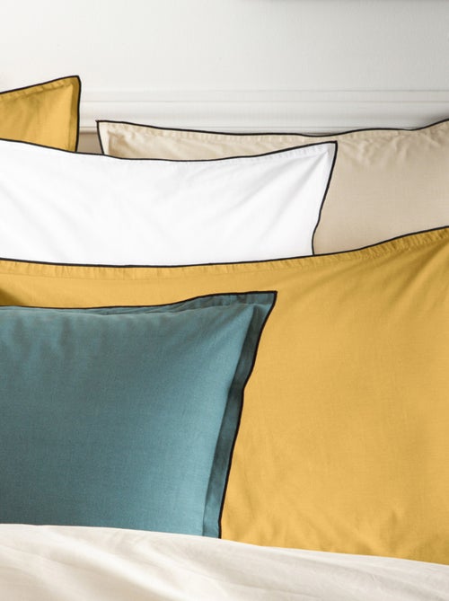Lote de 2 fundas de almohada lisas de algodón con ribete - Kiabi Lote de 2 fundas de almohada lisas de algodón con ribete - Kiabi