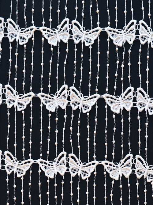 Malla modular de macramé mariposa - Kiabi Malla modular de macramé mariposa - Kiabi