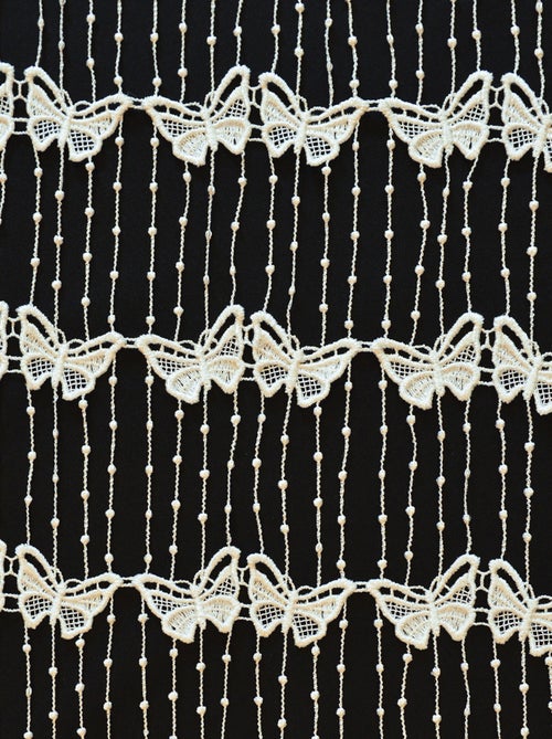Malla modular de macramé mariposa - Kiabi Malla modular de macramé mariposa - Kiabi