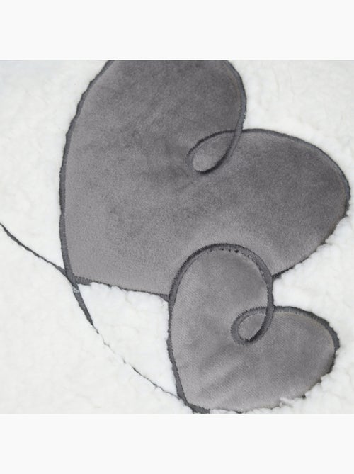 Manta efecto borreguito con diseño de corazones - Kiabi