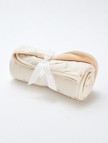 Manta estampada con interior de tejido polar