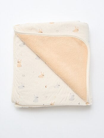 Manta estampada con interior de tejido polar