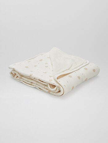 Manta estampada con interior de tejido polar