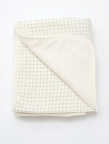 Manta estampada con interior de tejido polar