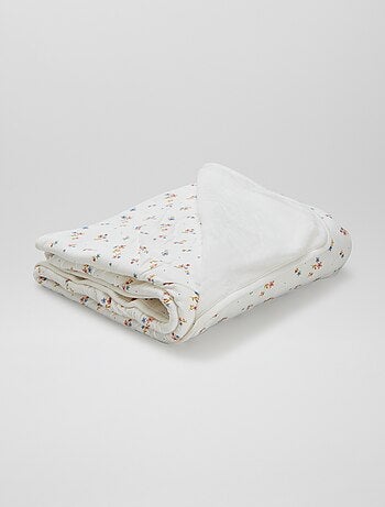 Manta estampada con interior de tejido polar