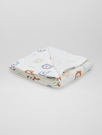 Manta estampada con interior de tejido polar