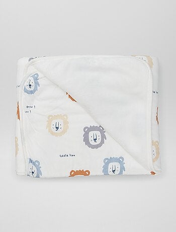 Manta estampada con interior de tejido polar