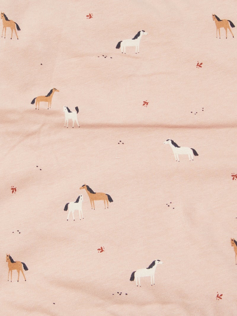 Manta estampada con interior de tejido polar ROSA - Kiabi