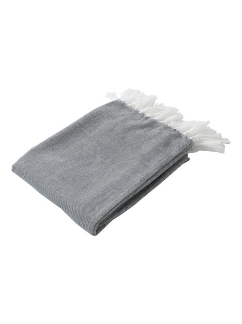 Manta jacquard con largos flecos - Kiabi Manta jacquard con largos flecos - Kiabi