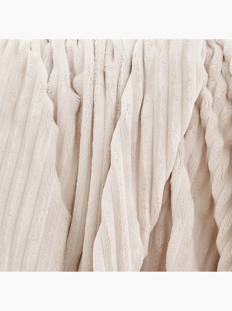 Manta polar con efecto acanalado en 3D Beige claro - Kiabi