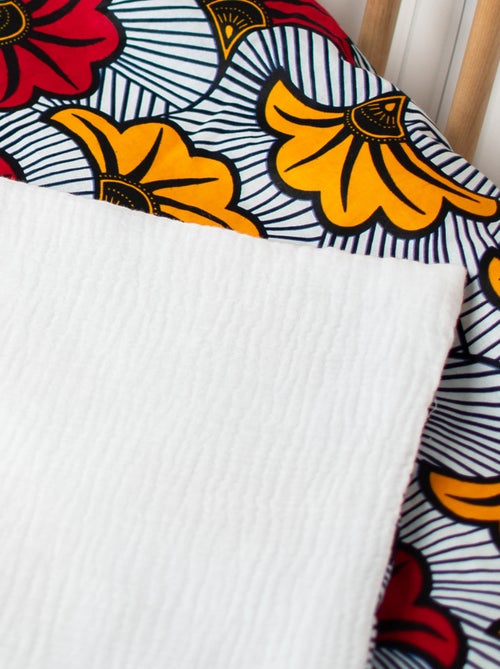 Manta reversible de gasa de algodón y tejido wax | SEVIRA KIDS - Kiabi