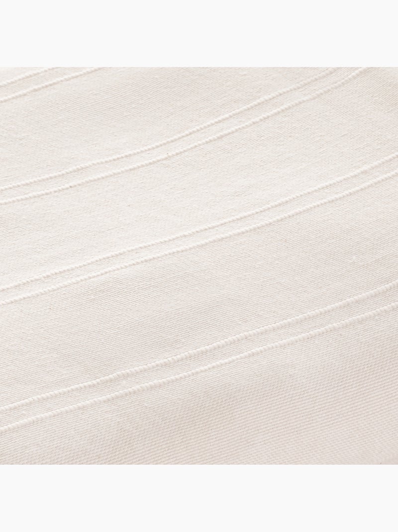 Manta tipo Plaid, tejido texturizado de hilo tintado, con borde rematado - Gamusi Crudo - Kiabi