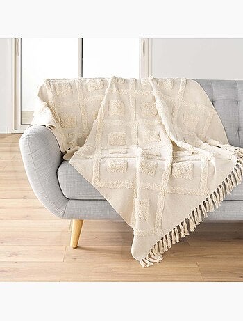 Manta tufted con borlas