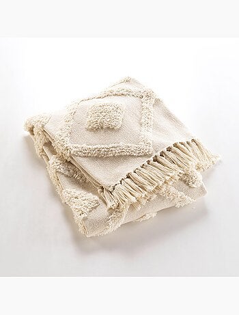 Manta tufted con borlas