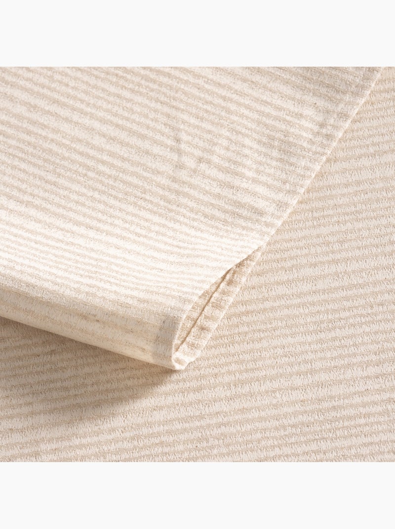 Mantel antimanchas con tejido texturizado a rayas finas -  Gamusi. Beige - Kiabi
