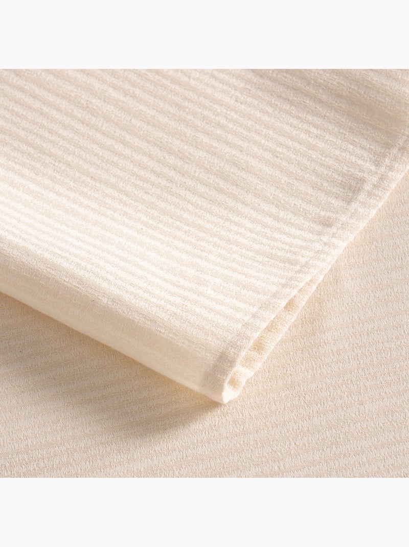Mantel antimanchas con tejido texturizado a rayas finas -  Gamusi. Crema - Kiabi