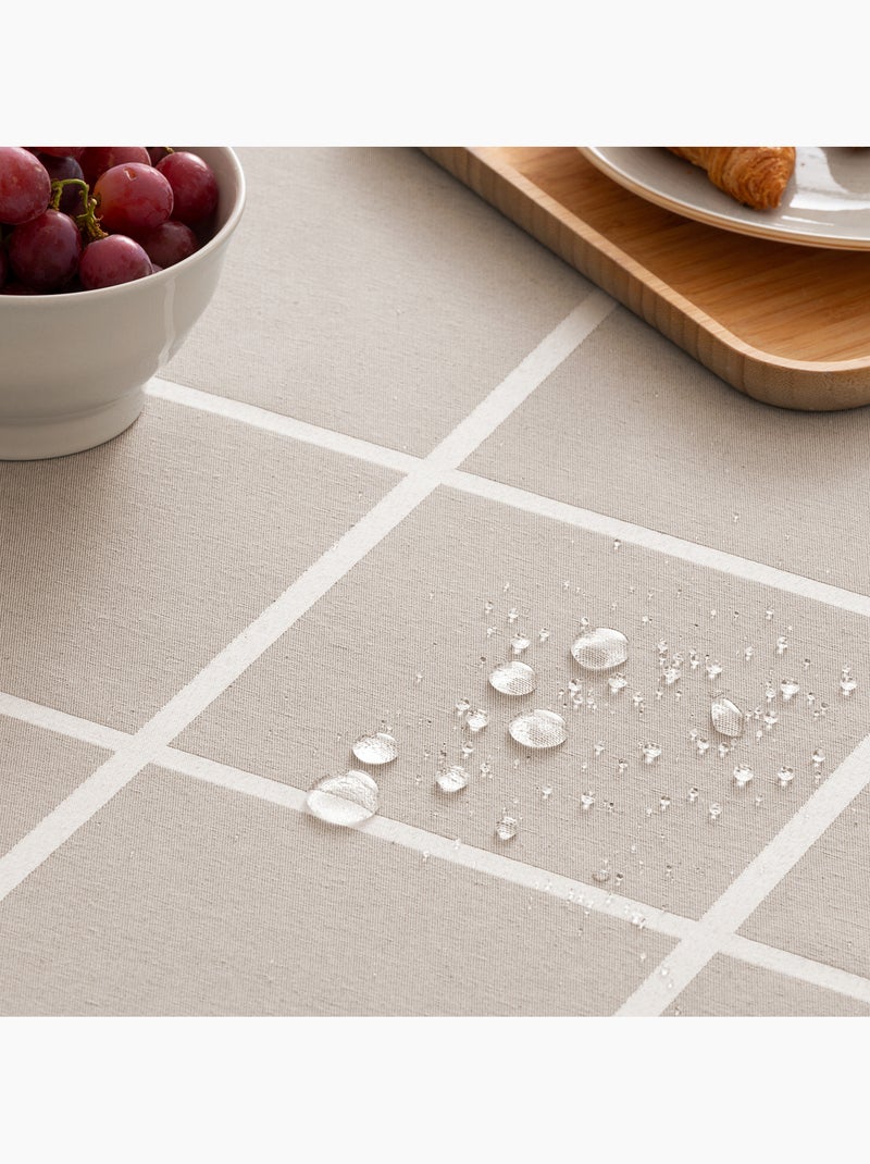 Mantel antimanchas con tejido texturizado, diseño a cuadros grandes -  Gamusi. Beige - Kiabi