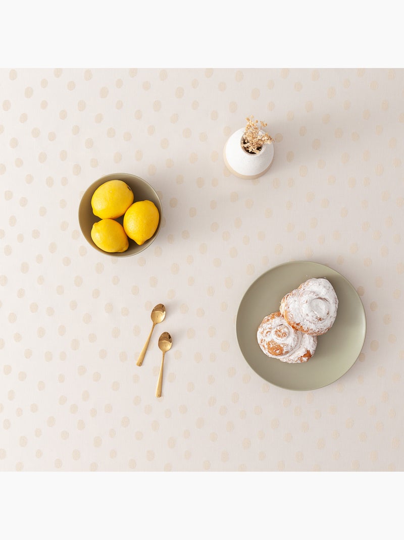 Mantel antimanchas con tejido texturizado, diseño a puntos -  Gamusi. Oro - Kiabi