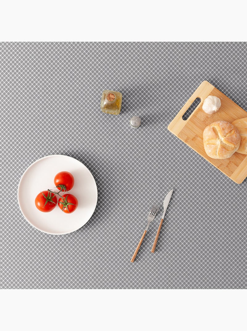 Mantel antimanchas con tejido texturizado, diseño cuadros en rejilla -  Gamusi. Gris antracita - Kiabi