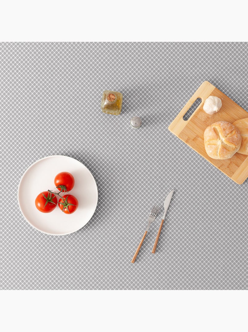 Mantel antimanchas con tejido texturizado, diseño cuadros en rejilla -  Gamusi. Gris claro - Kiabi