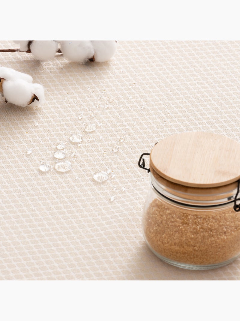 Mantel antimanchas con tejido texturizado, diseño cuadros en rejilla -  Gamusi. Oro - Kiabi