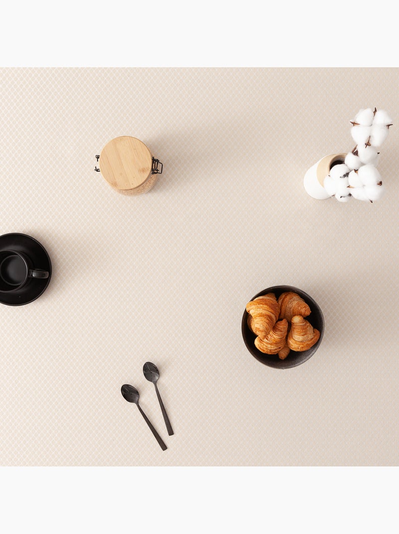 Mantel antimanchas con tejido texturizado, diseño cuadros en rejilla -  Gamusi. Oro - Kiabi