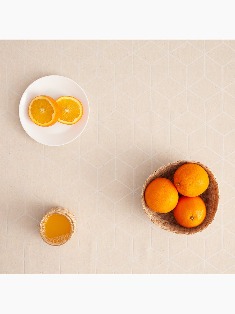 Mantel antimanchas con tejido texturizado, diseño geométrico -  Gamusi. Crudo - Kiabi