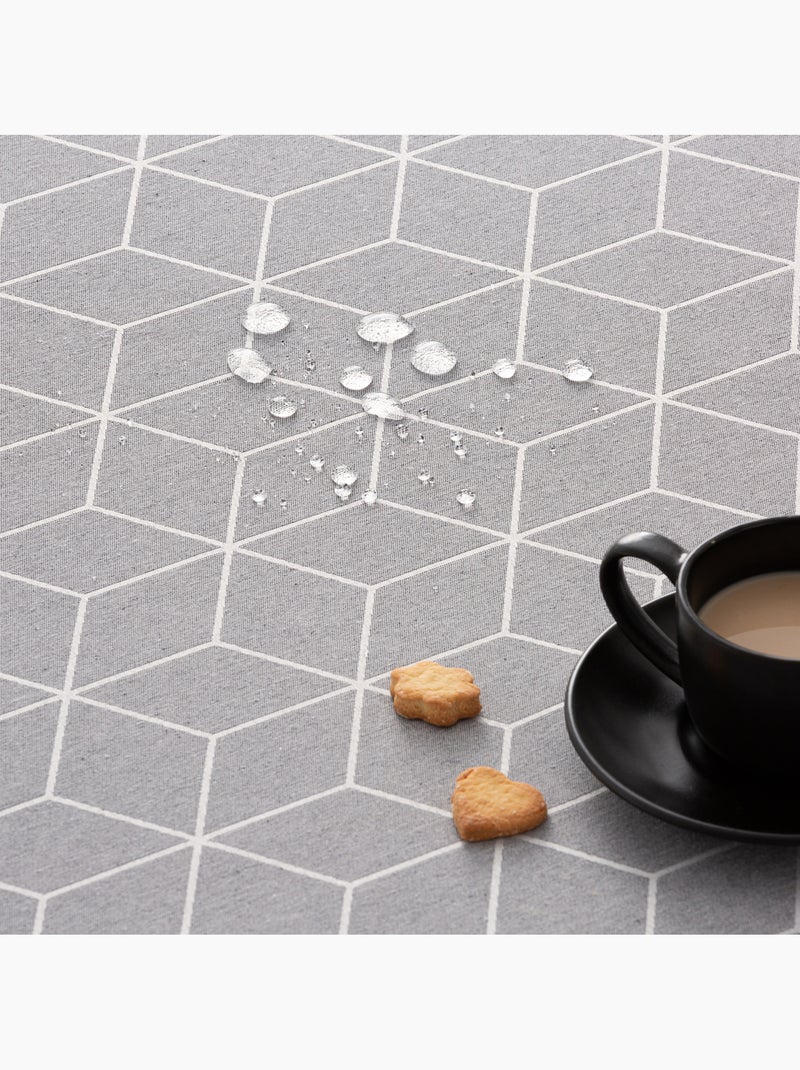 Mantel antimanchas con tejido texturizado, diseño geométrico -  Gamusi. Gris - Kiabi