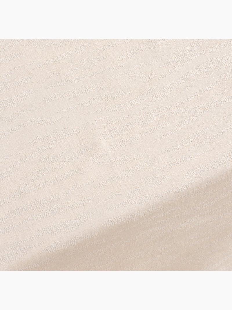 Mantel antimanchas con tejido texturizado efecto veteado -  Gamusi. Crema - Kiabi