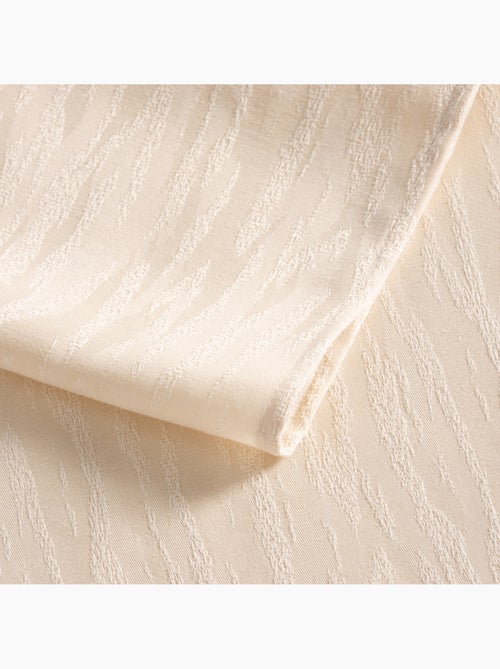 Mantel antimanchas con tejido texturizado efecto veteado - Gamusi. - Kiabi Mantel antimanchas con tejido texturizado efecto veteado - Gamusi. - Kiabi
