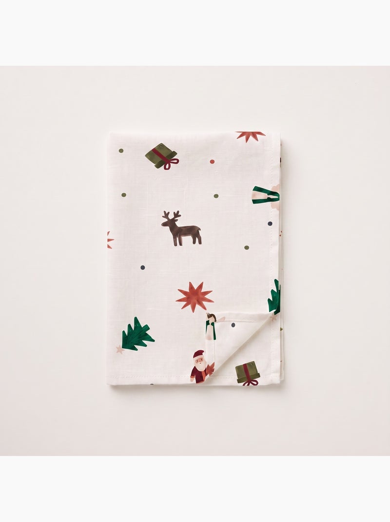 Mantel navideño impermeable con estampado de papá noel, renos, regalos y abetos - gamusi. Blanco - Kiabi