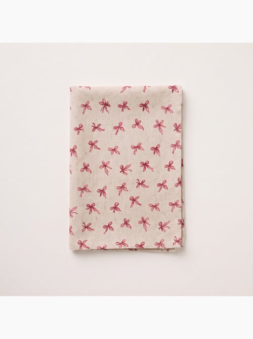 Mantel navideño tacto lino natural con estampado de lazos - gamusi. - Kiabi