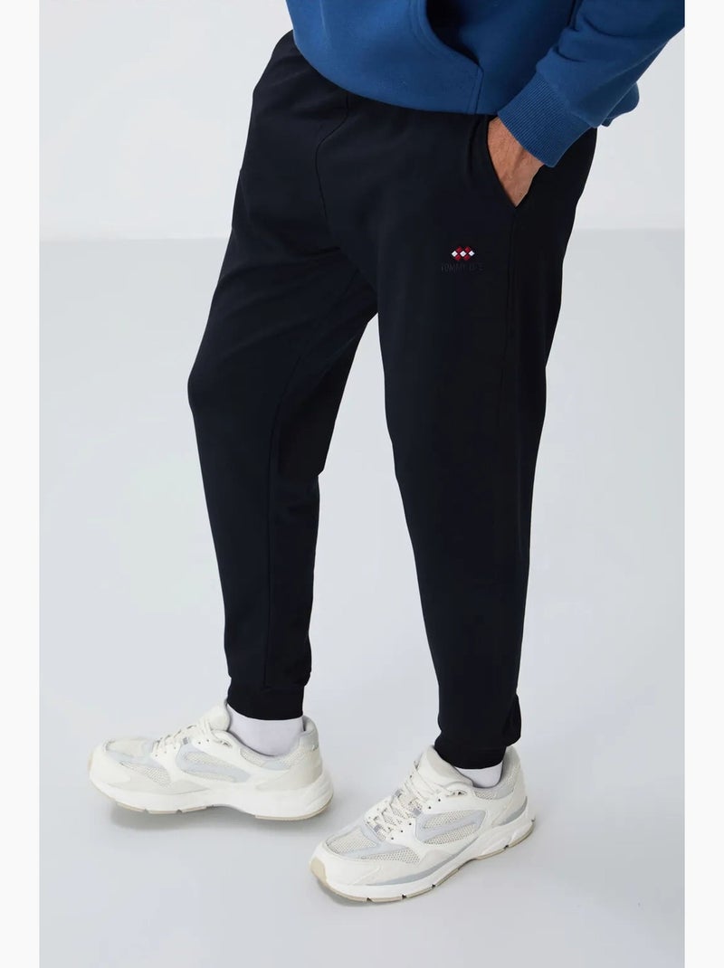 Men's pantalón de chándal de forro polar liso tommy Azul laguna - Kiabi