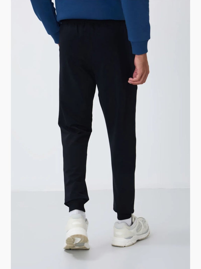 Men's pantalón de chándal de forro polar liso tommy Azul laguna - Kiabi