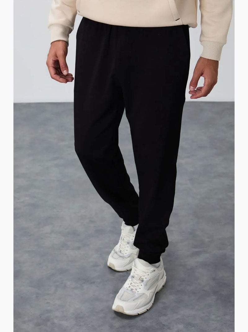 Men's pantalón de chándal de forro polar liso tommy Negro - Kiabi