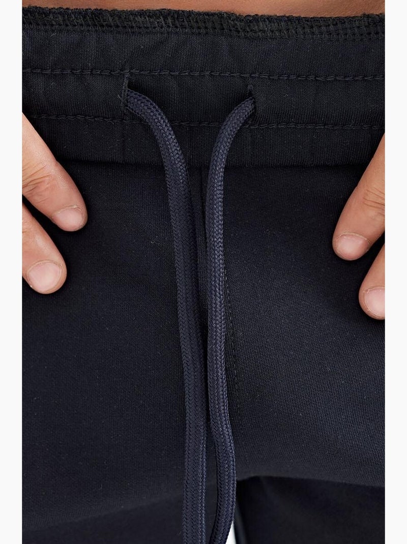 Men's pantalones cortos de felpa de punto lisos tommy Azul laguna - Kiabi