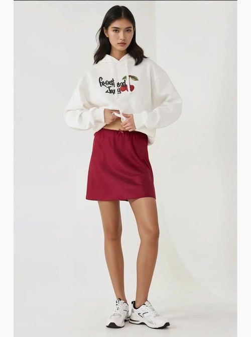 Minifalda de satén suave con forma de a hiccup - Kiabi Minifalda de satén suave con forma de a hiccup - Kiabi