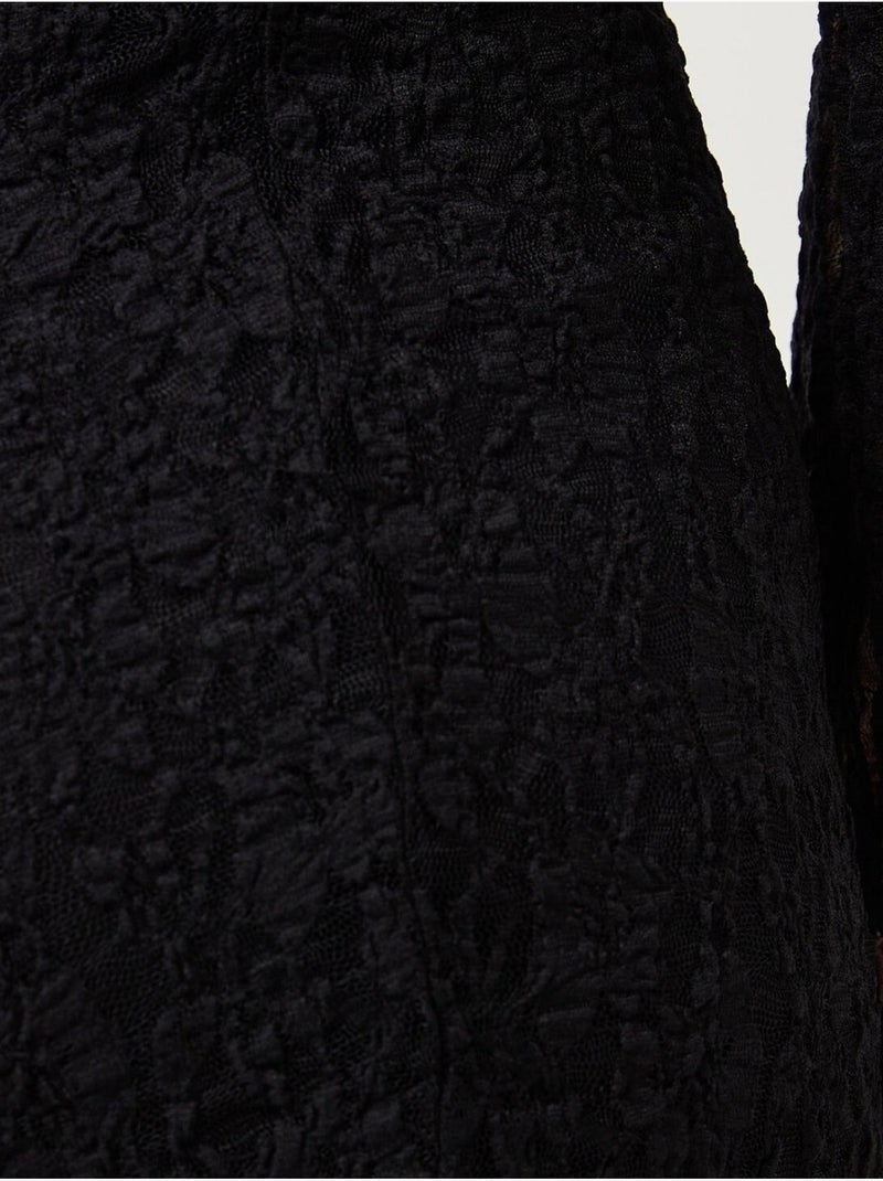 Minivestido ajustado de encaje con forro Negro - Kiabi